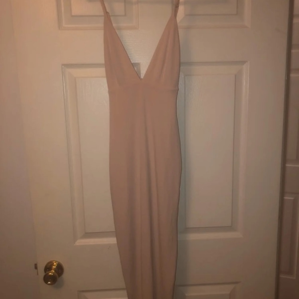 Worn once. Beautiful Nookie nude dress